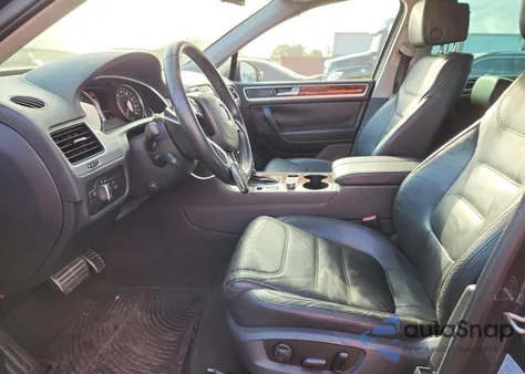 2012 Volkswagen Touareg Hybrid from USA, damaged, VIN WVGFG9BP5CD004543